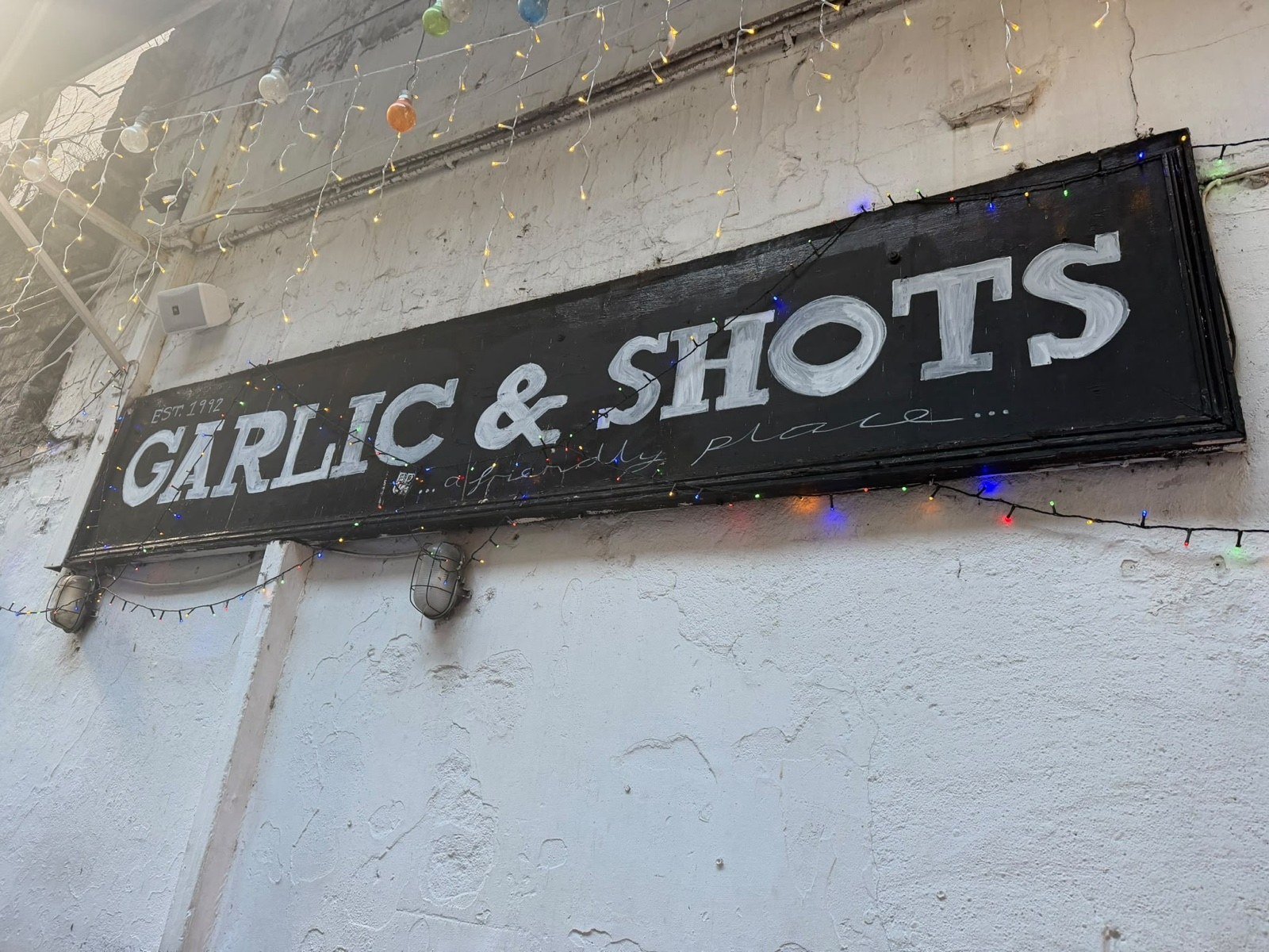 Garlic & Shots sign